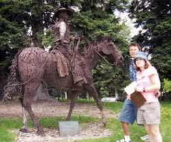 Nelson Story on horse back, Jamie and Gabe in foreground